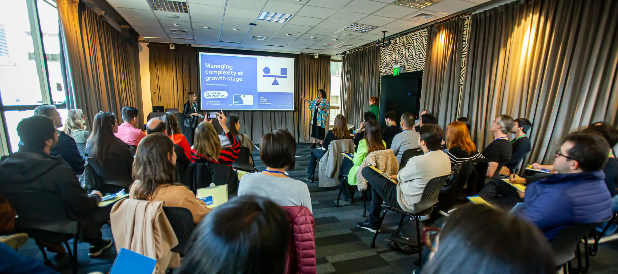 A lady is giving presentation.